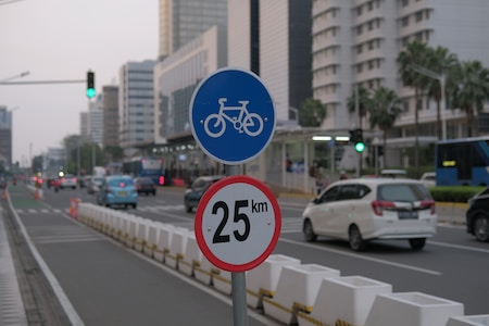 a couple of signs that are on a pole